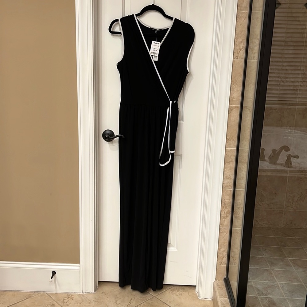 Black and white jumpsuit. Size M TALL